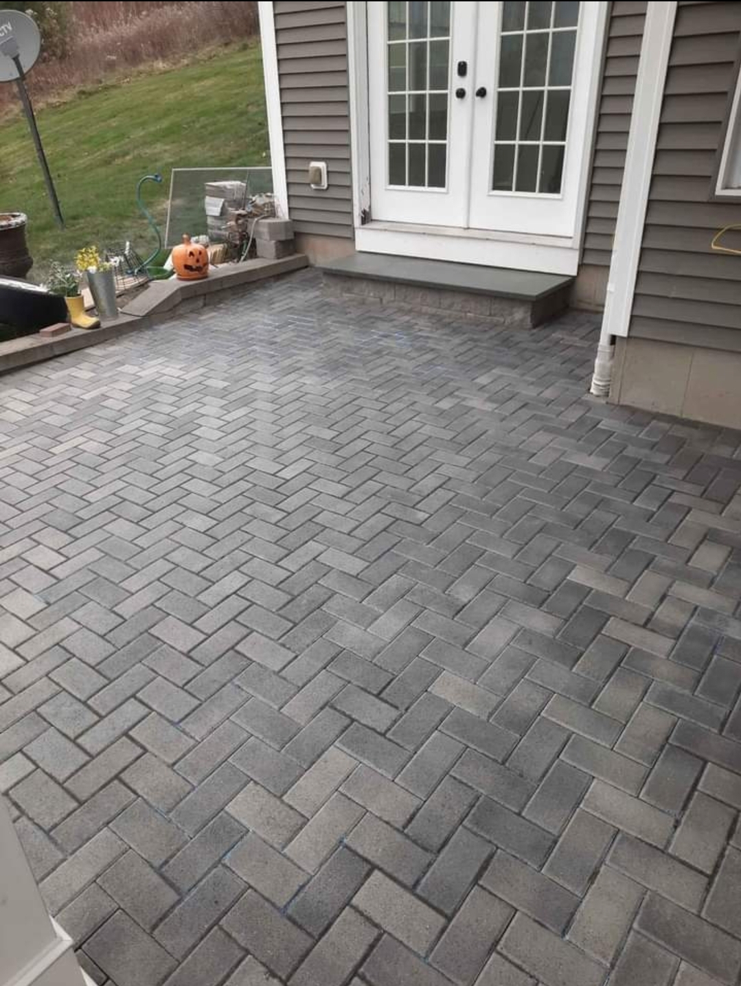 Crafting Comfort & Style: Paver Patio Installation with Precision and Modern Design